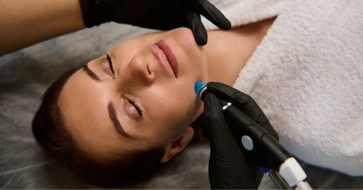 Woman receiving a HydraFacial 2.0 treatment for glowing skin at a medical spa in Aldie, VA