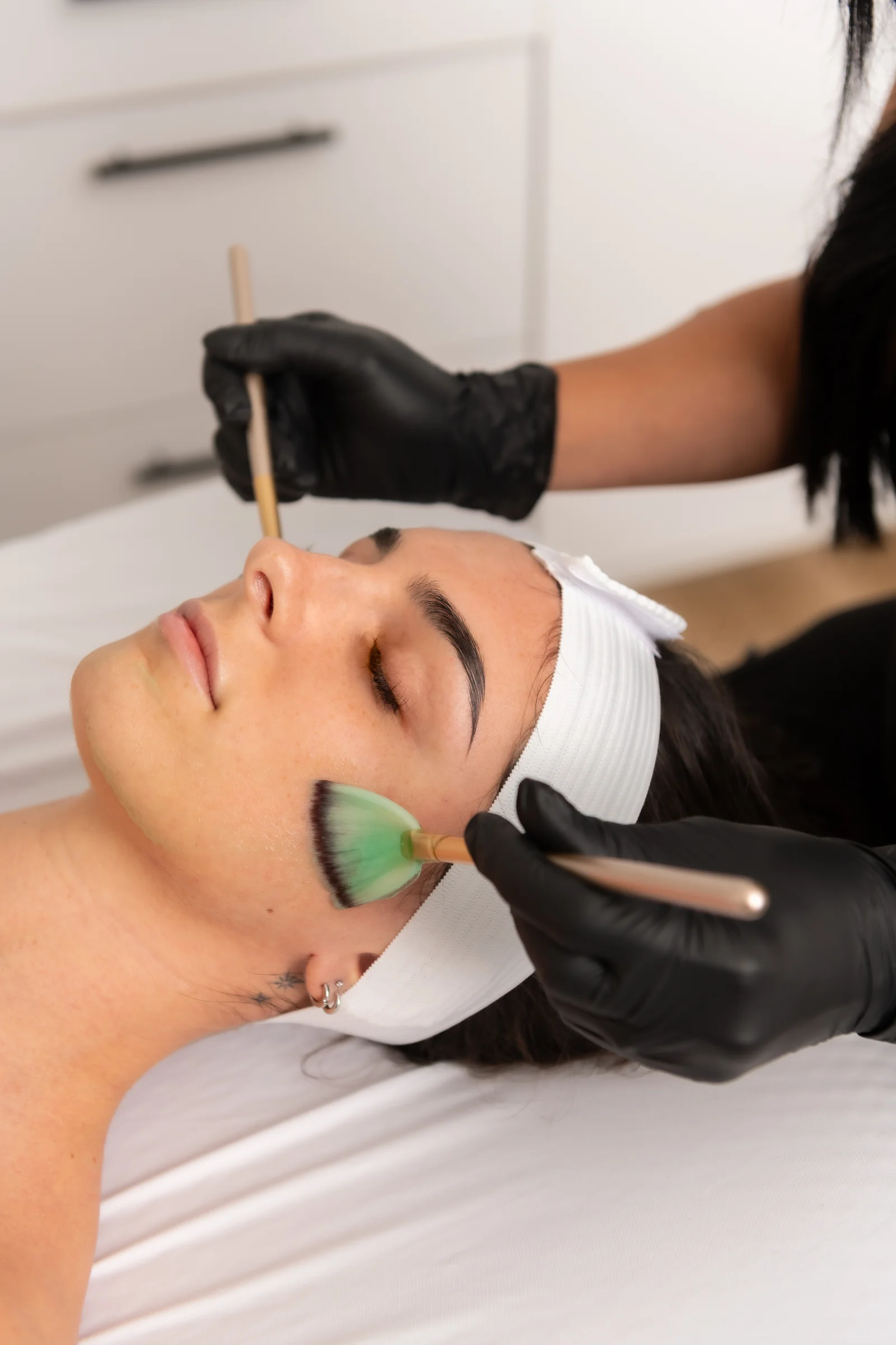 A client receives a facial in Aldie at Envi Aesthetics.